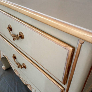 Bedside table - baroque style inspired, white with golden framing.